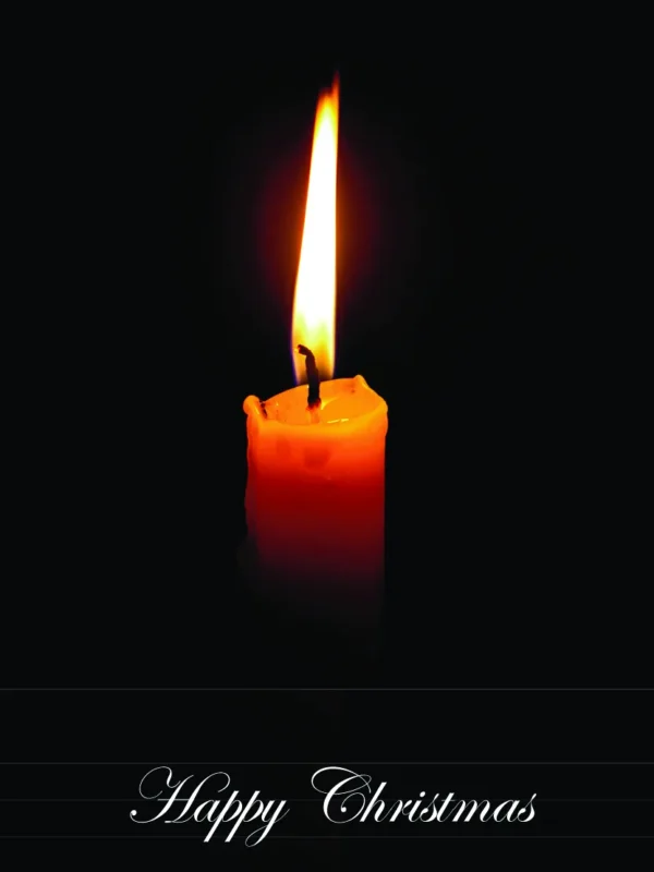 A lit orange candle against a black background with the text "Happy Christmas" below it, evoking a warm holiday feel