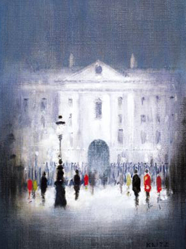 A misty scene of Trinity College with a crowd of people in colorful coats, illuminated by a streetlamp at dusk